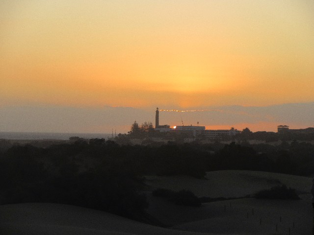 Solnedgang p Maspalomas stranden og Faro 